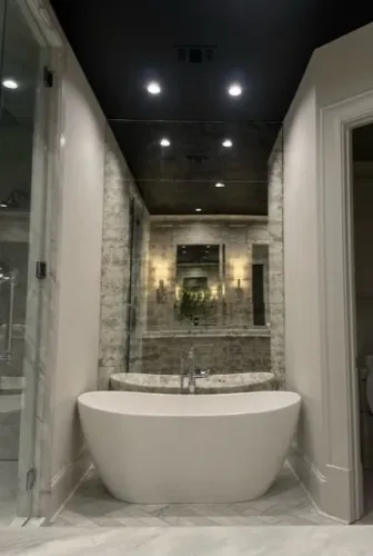 Antique mirror tile wall installation with custom sizing